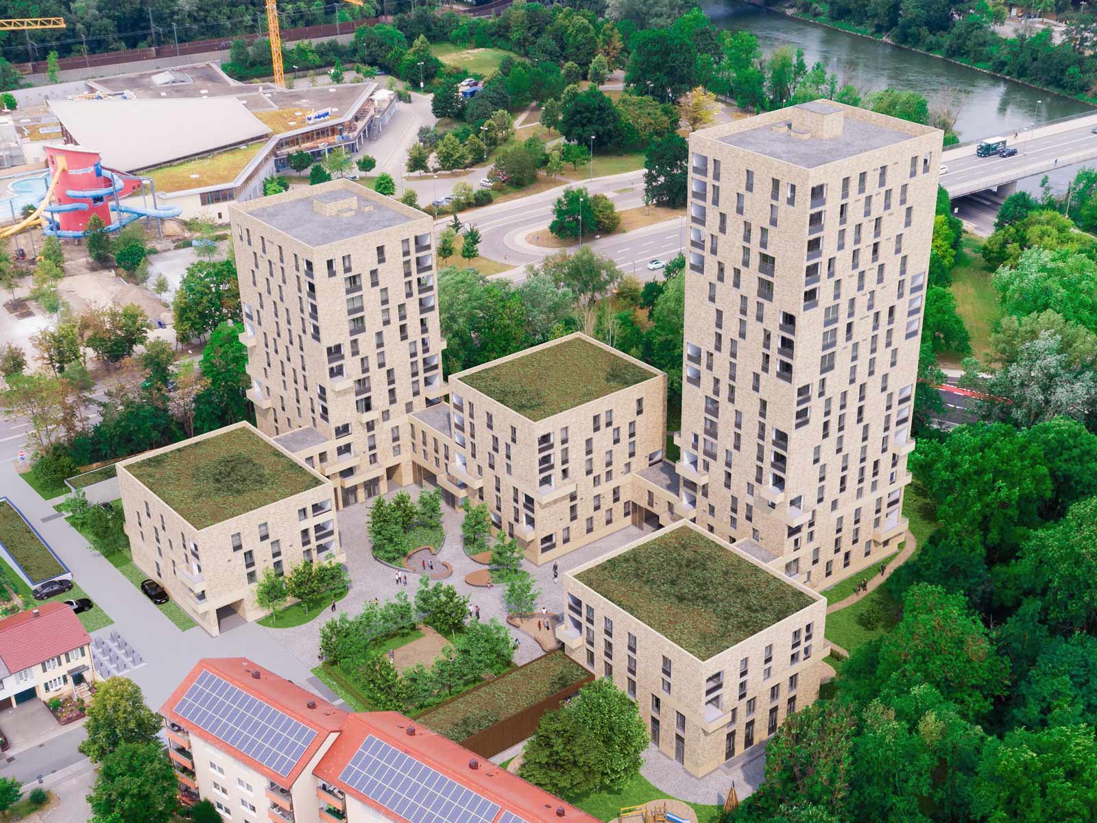 Visualisierung des neubaus an der Stargarder Straße Ingolstadt: 3 niedrige und 2 hohe Gebäude mit hellbrauner Fassade im Grünen.